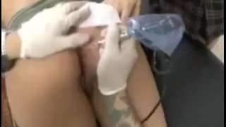 Amateur babe gets her asshole tattooed